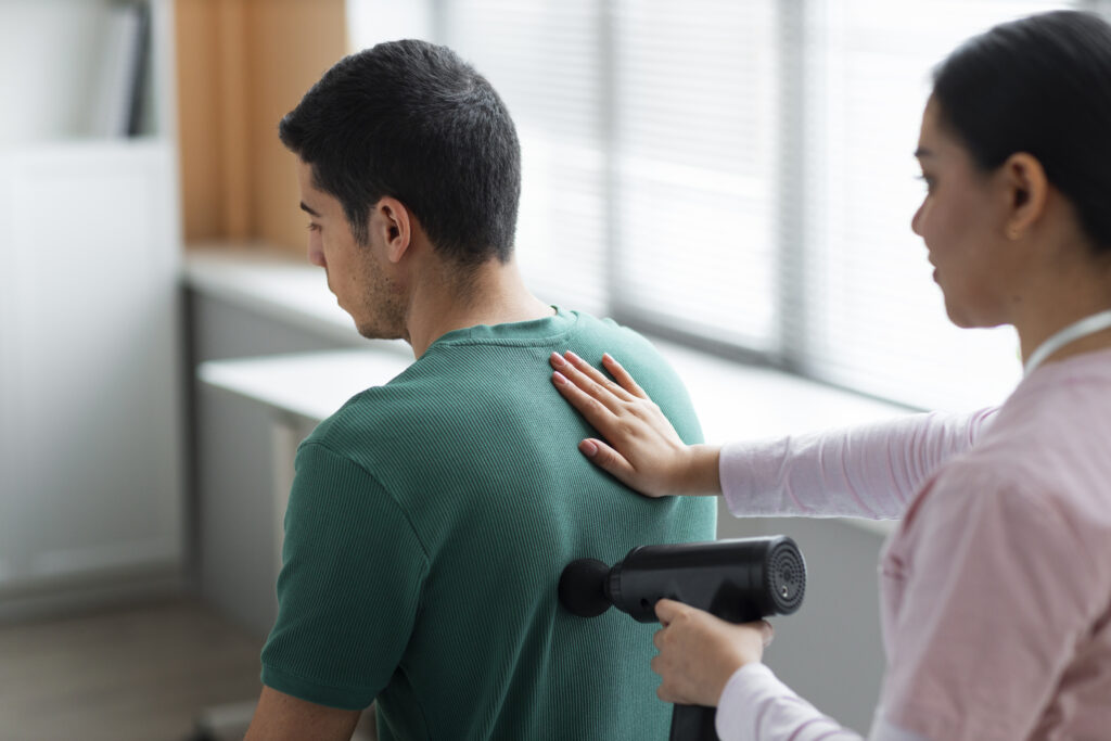 doctor helping patient rehabilitation