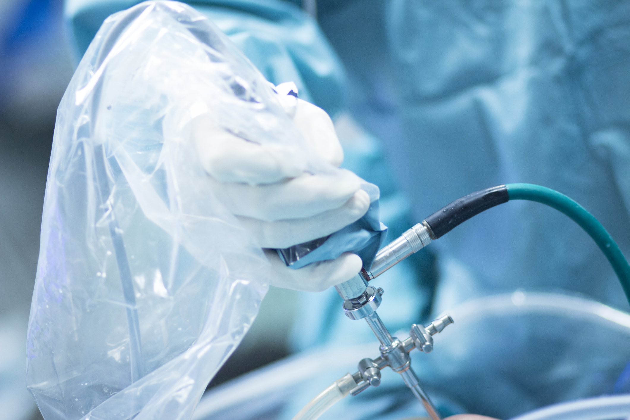 Surgeon holding arthroscope during procedure